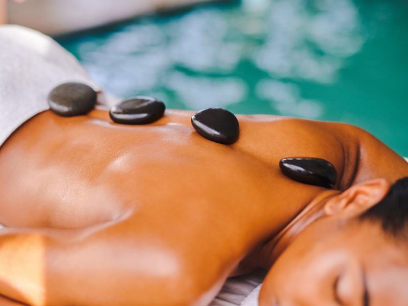 hot-stone-massage-GettyImages-1372664129-fecefea5f71c44f7aaeaf4ae5dbfcbe4